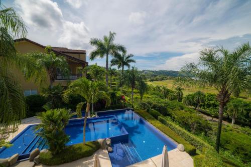 an image of a swimming pool at a resort at Vista Bahia 3C - 3bdr 3 bath ocean View in La Mona