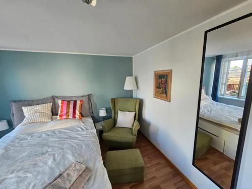 Ένα ή περισσότερα κρεβάτια σε δωμάτιο στο T1 Gästehaus Wohlen AG