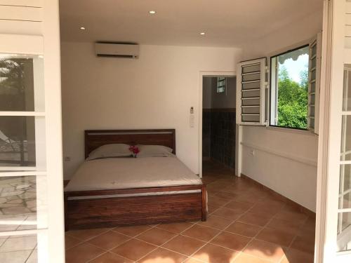 Ένα ή περισσότερα κρεβάτια σε δωμάτιο στο Villa Serenity, Quiet, Pool, Seaside