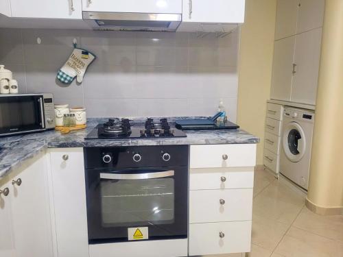 O bucătărie sau chicinetă la Castelinho Sal Lodge