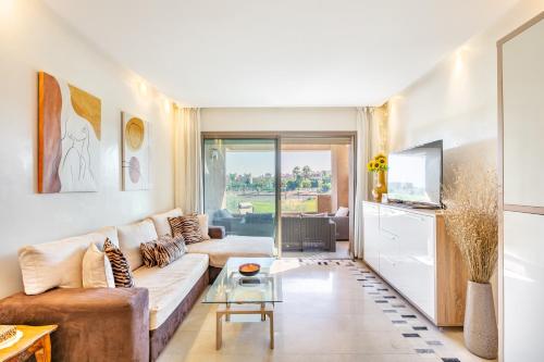 TV a/nebo společenská místnost v ubytování Golf View Escape