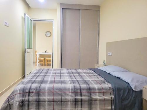 Un pat sau paturi într-o cameră la Castelinho Sal Lodge