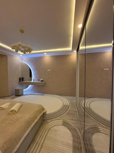 Ένα μπάνιο στο Cozy apartment in the Heart of Bukhara