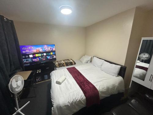 Postel nebo postele na pokoji v ubytování Romantic Guest Rooms