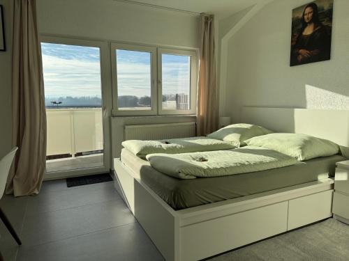 Ένα ή περισσότερα κρεβάτια σε δωμάτιο στο Durdi Hotels Groß-Zimmern 24h Self-CheckIn