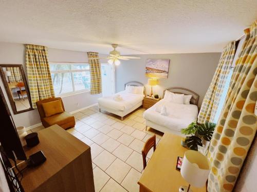 Ένα ή περισσότερα κρεβάτια σε δωμάτιο στο Great Escape Apartments By Lowkl