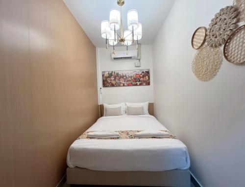 Postel nebo postele na pokoji v ubytování Sleeping Shine by DeliZia Satun พักได้ 9-10 ท่าน