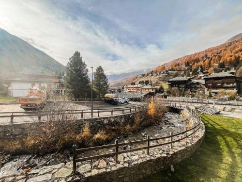 Galería fotográfica de Rifugio delle Cascate - Poluc Apartments Bilocale en Champoluc