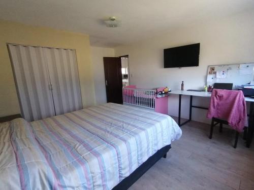 Ένα ή περισσότερα κρεβάτια σε δωμάτιο στο La Esquina