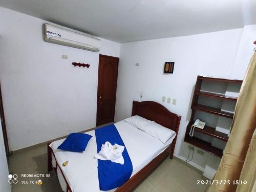 Postel nebo postele na pokoji v ubytování Anyros Plaza