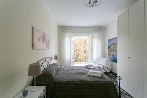 Кровать или кровати в номере Great holiday appartamento moderno comodo a centro e spiagge