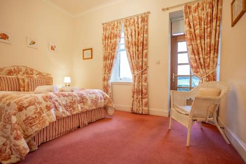 Postel nebo postele na pokoji v ubytování Golf Court No 5 - Elie