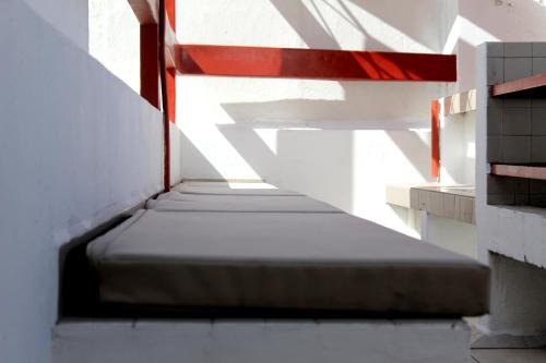 Ένα ή περισσότερα κρεβάτια σε δωμάτιο στο INMOTEGA - Suites TG