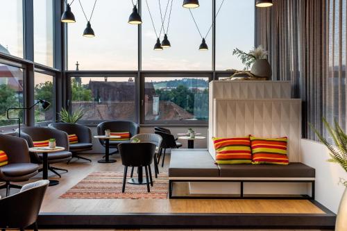 Khu vực ghế ngồi tại harry's home Steyr hotel & apartments