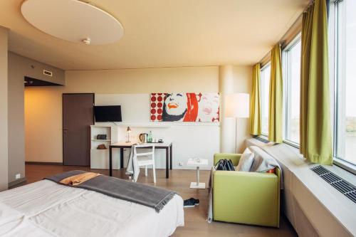 Postel nebo postele na pokoji v ubytování harry's home Wien hotel & apartments