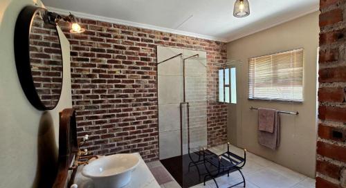 Ένα μπάνιο στο Luxury Self Catering Unit