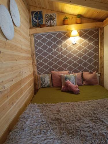 a small room with a bed in a cabin at The Corsair Cottage in Kalymnos