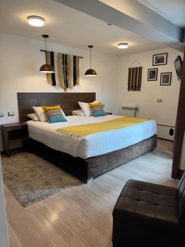 Postel nebo postele na pokoji v ubytování CASA CRISTOBAL Centenario