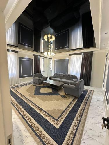 Χώρος καθιστικού στο Mekhtarr Anbar Historical Hotel