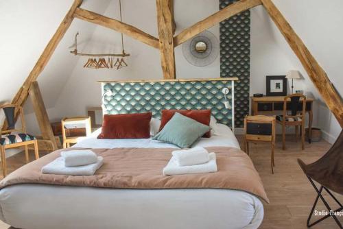 Ένα ή περισσότερα κρεβάτια σε δωμάτιο στο ClosSaintJoseph - Jacuzzi&Sona - Piscine ext chauffée