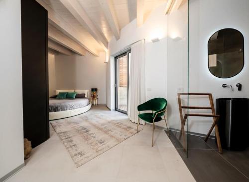 Giường trong phòng chung tại Attico Salia