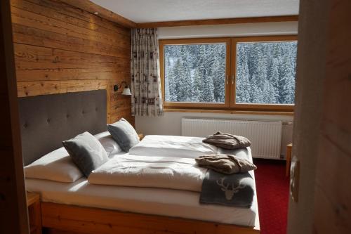 Postel nebo postele na pokoji v ubytování MBZ Birg 1414