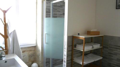 Ένα μπάνιο στο Le Domaine des Tourterelles Gîte Estuaire