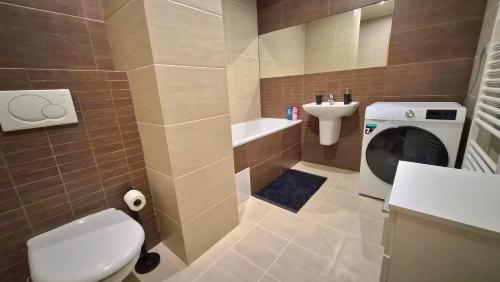 Et badeværelse på Apartmán ELEVEN