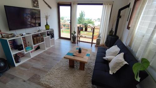 Et tv og/eller underholdning på Cabaña del Mirador 5