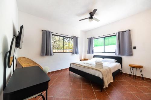 Ένα ή περισσότερα κρεβάτια σε δωμάτιο στο Finca Dos Encinos