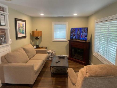 a living room with a couch and a fireplace at 855 N Grant Ave in Loveland