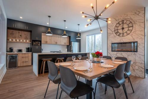 Køkken eller tekøkken på Le Birdie spa et sauna