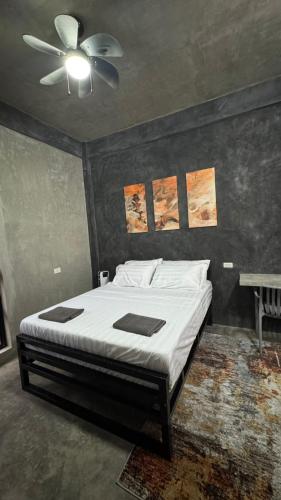 Postel nebo postele na pokoji v ubytování greyhouse moalboal