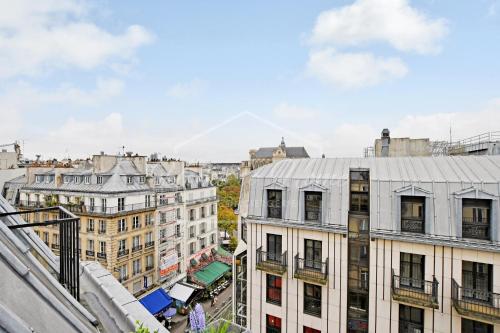 Studio Paris Centre avec Vue & Balcon