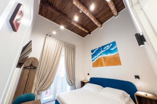 Postel nebo postele na pokoji v ubytování Le Sei Porte