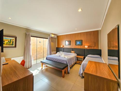 Postel nebo postele na pokoji v ubytování Hotel Paraíso das Águas Bonito