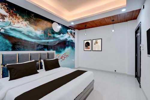 En eller flere senge i et værelse på Hotel O Sindhu Palace