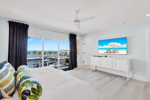 Кровать или кровати в номере Sea Watch