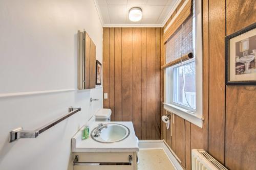 a bathroom with a sink and a window at Roomy Lancaster Home Walk to Dtwn and Hospital in Lancaster