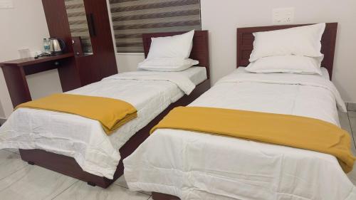 Postel nebo postele na pokoji v ubytování TAMARA VISTA Executive Homestay