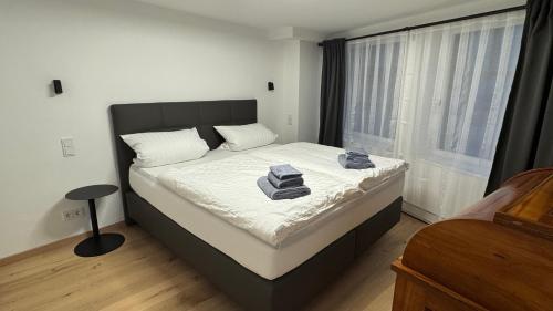 Postel nebo postele na pokoji v ubytování Brück Residenz