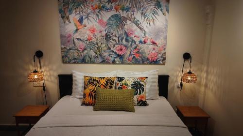 Ένα ή περισσότερα κρεβάτια σε δωμάτιο στο Bayside & Beach Inn Langkawi