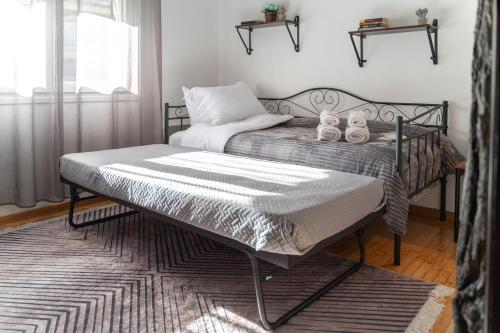 Postel nebo postele na pokoji v ubytování aEN Fine Living