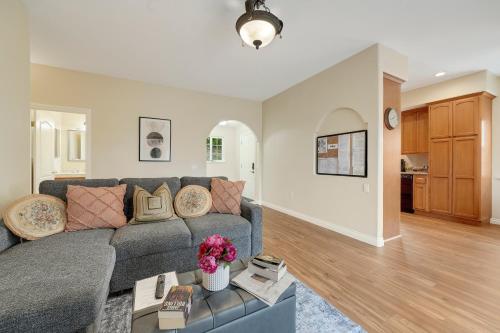 a living room with a couch and a table at Healdsburg Wine Country Escape with Tasting Perks & Vineyard Views in Healdsburg