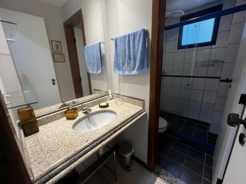 Et badeværelse på ESathler ar garagem pertinho da praia