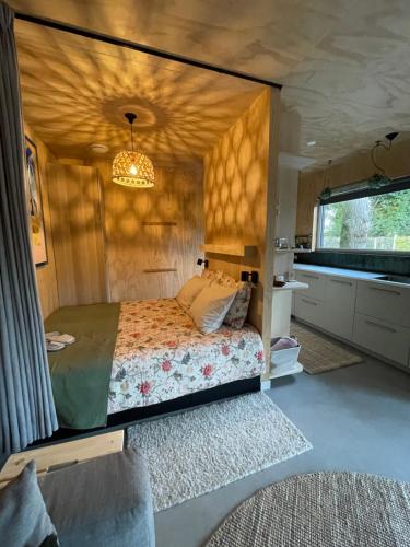 Postel nebo postele na pokoji v ubytování De Eikenloft