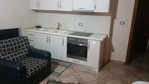 Kuchyň nebo kuchyňský kout v ubytování Businesses Apartment 2