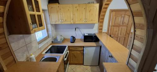 Η κουζίνα ή μικρή κουζίνα στο Dom Wypoczynkowy Góra&Vita