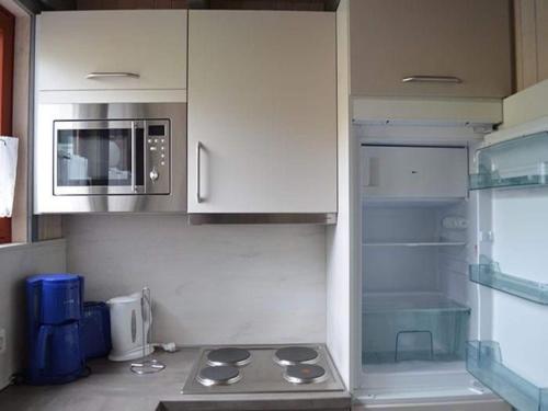 Η κουζίνα ή μικρή κουζίνα στο Ferienhaus im Ferienpark Mirow