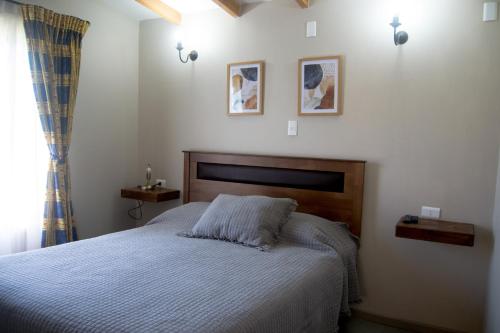 Postel nebo postele na pokoji v ubytování Cabañas Raco